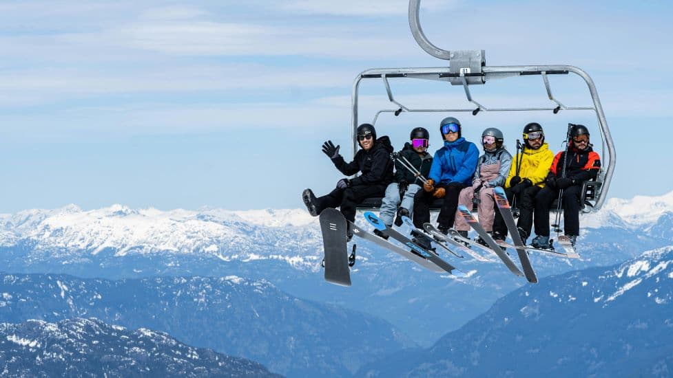 First-time skiers overlooking an Austrian alpine resort